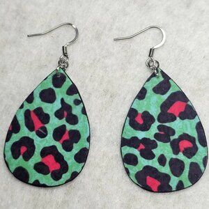 Handmade teardrop earrings with a teal and hot pink leopard print on both sides